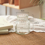vases verre transparents texturés lignes verticales horizontales motifs petits bosses