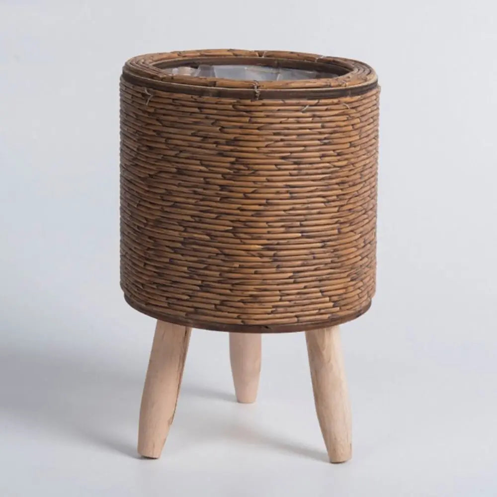cache pot tressé rotin moderne cactus feuilles vertes marron clair pieds bois durable tissé