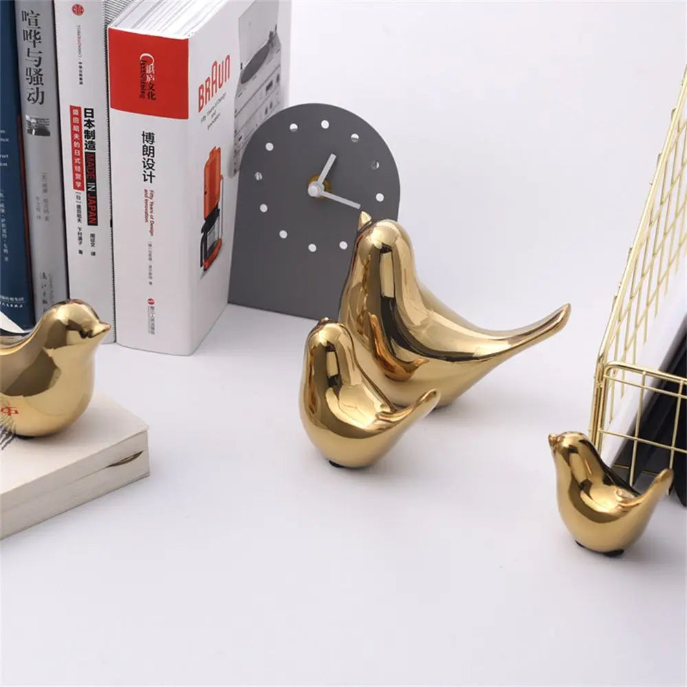 décoration intérieure moderne oiseau céramique doré lisse brillant grande taille minimaliste