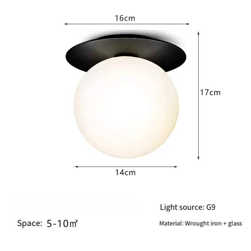 lampe moderne verre transparent noir doré élégante sphérique éclairage contemporain