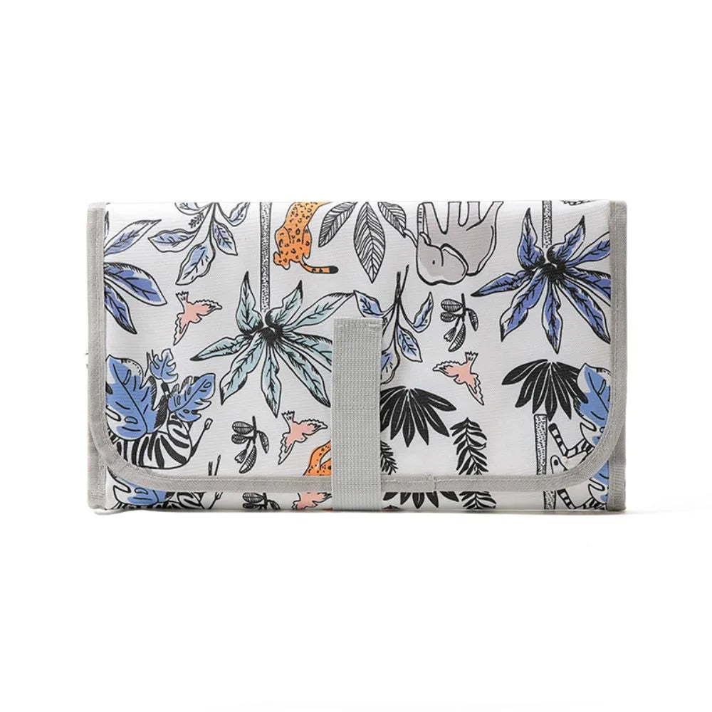 tapis changement portable bébé motif animalier blanc gris bleu