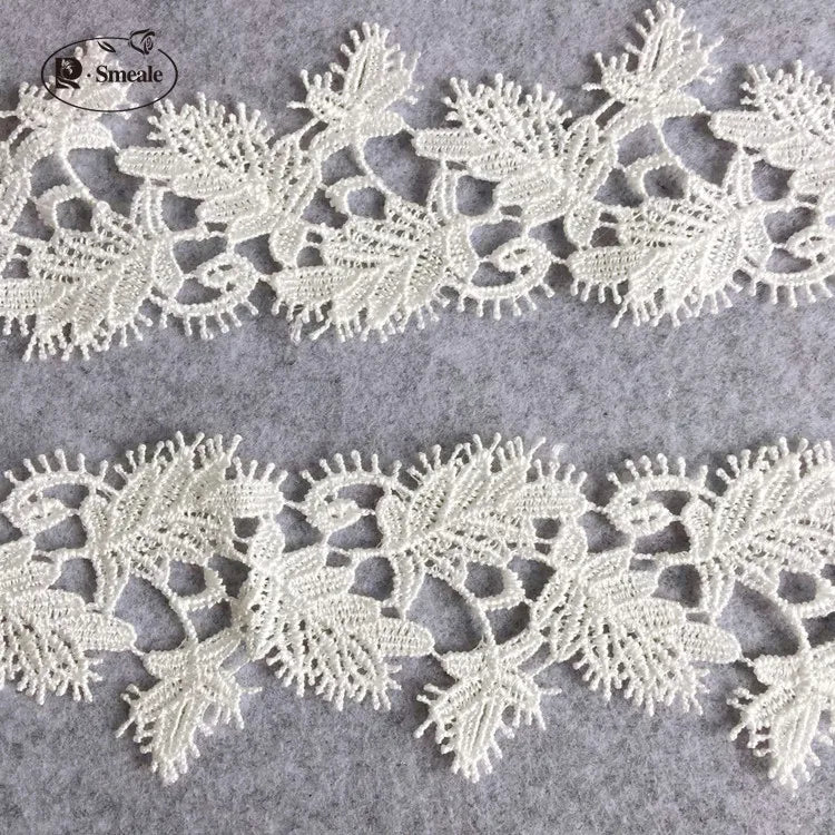dentelle polyester feuilles stylisées broderie fine 5.8cm large blanc opacité yards yards off white