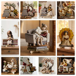 figurines bois fille lecture supports livres fleurs vases tulipes lavande théière bougiesDecorationChampetreSpirituelle