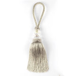 pompon porte élégant brodé couleur beige doré argenté gris blanc textile maison