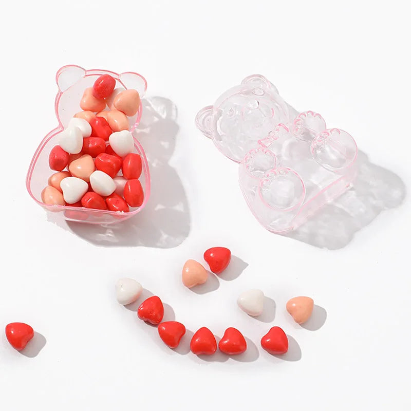 boîtes bonbons ours transparentes rose clair contemporaines mignonnes coeurs rouges blancs oranges mariage snacks
