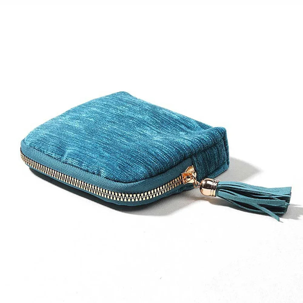 porte bijoux velours bleu marine poches intérieures moderne élégant fermeture glissière poignées velours blanc