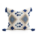 housse coussin carré boho chic motifs géométriques pompons couleur neutres décor maison