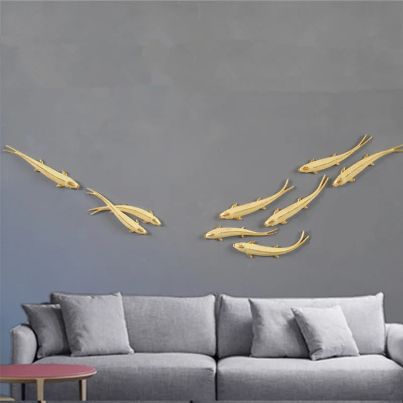 décoration intérieure moderne sculpture poissons dorés résine or fixations invisibles set pièces