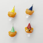 bougies d'anniversaire nounours chapeau fête couleurs marron vert bleu jaune festive opaques