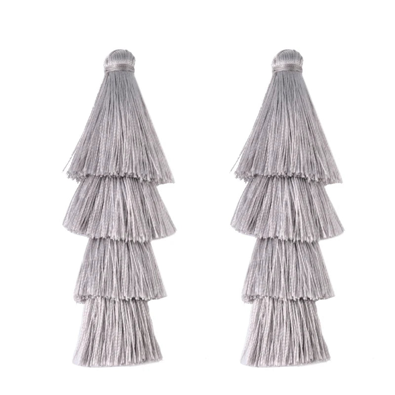 pompons franges polyester décoratifs modernes couleur bleu noir beige rose violet vert jaune blanc