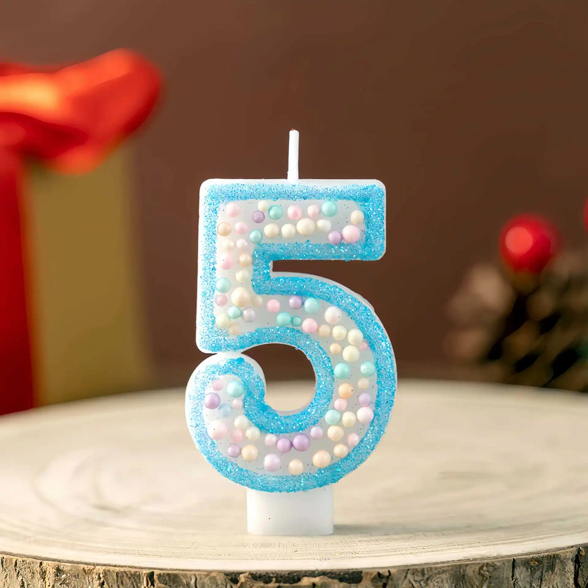 bougies anniversaire numéraires chiffres bleu pastel multicolores décoration gâteau enfant brillantes support blanc