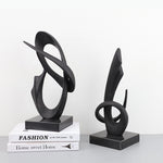 sculpture moderne grenade racine ginseng abstraite cercle noir doré livres décoration