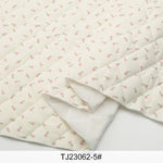 tissu imprimé fleurs lapins blanc rose vert bleu clair vintage enfantin résistant déchirure bricolage