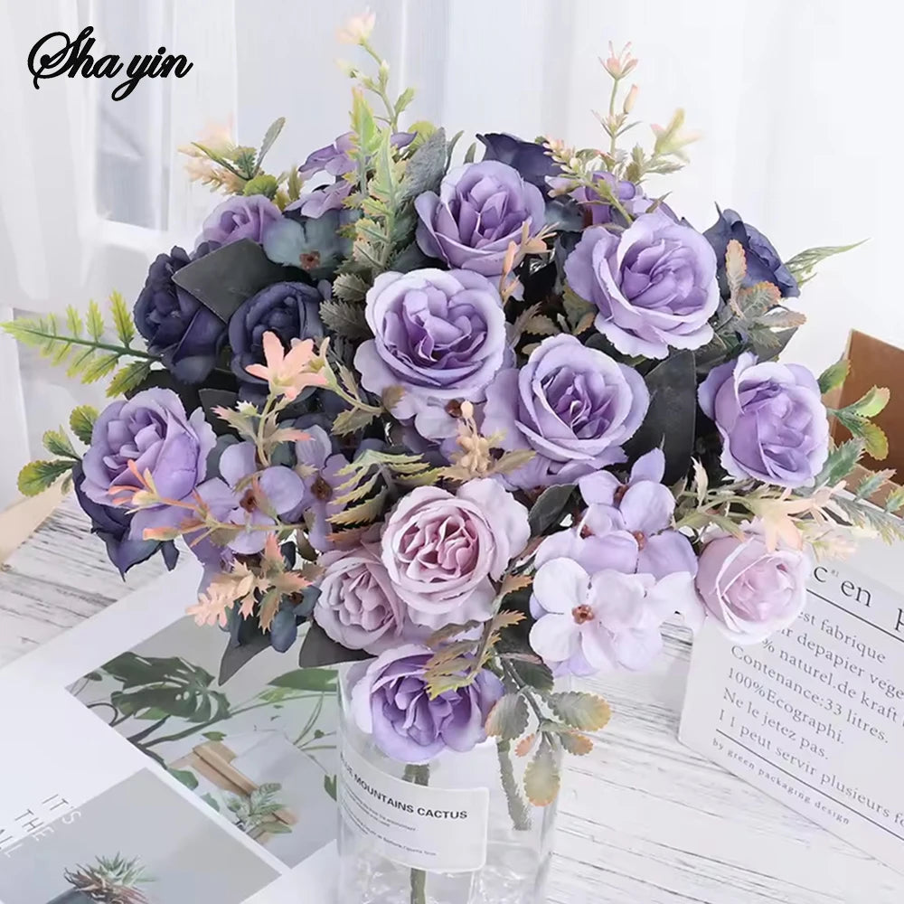 bouquet fleurs artificielles violet rose pêche blanc vert feuilles vertes vase transparent décoration intérieure