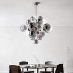 Suspension lumineuse moderne verre noir blanc gris billes translucides chaîne métallique