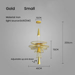 suspension lumineuse or noir contemporain minimaliste ampoule led intégrée fixation câbles métal superposé
