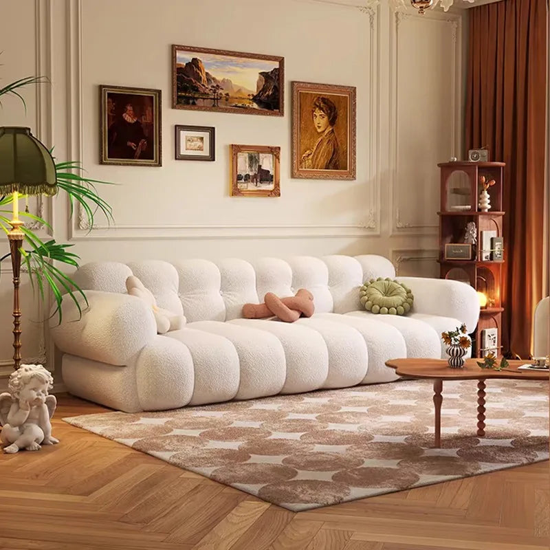 canapé moderne velours beige marron olive salon contemporain coussins différentes tailles