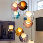 lampes suspendues modernes sphères colorées brillantes intensité variable transparentes opaques chambre salon