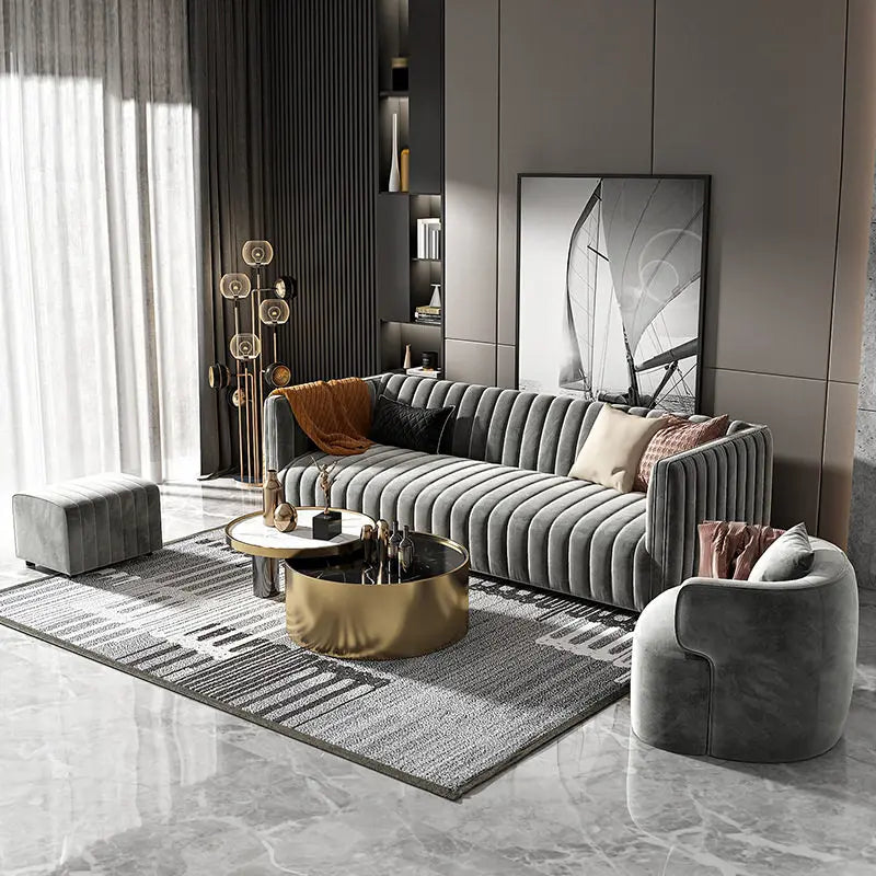 canapé gris velours moderne coussins pieds bois salon minimaliste
