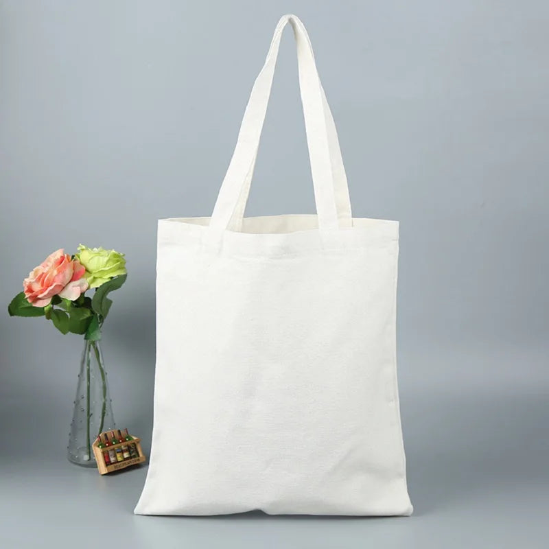 sac main toile réutilisable noir blanc beige classique uni opacité poignées respectueux environnement multifonction