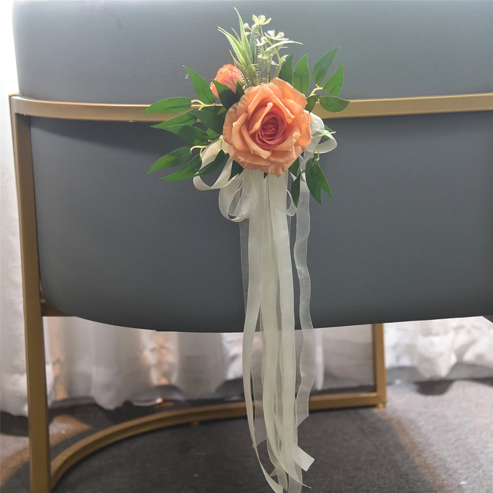 décoration mariage rose artificielle ruban eucalyptus feuilles verte chaise égliseextérieur