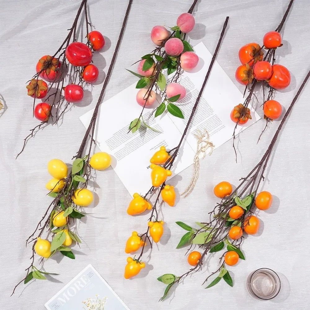 décoration intérieure branches fruits naturels pommes oranges citrons marrons festive maison anniversaire