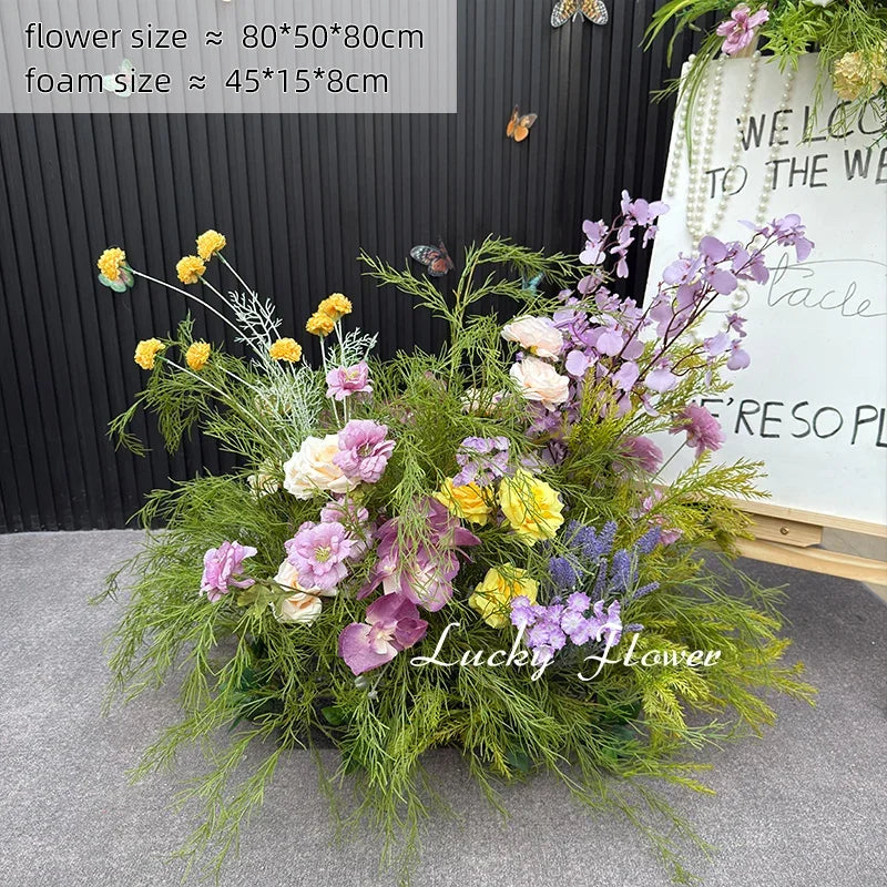 décoration murale naturelle composition florale variée couleurs vives rustique bienvenue mariage