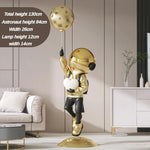 statuette astronaute résine couleur changeante doré argenté rose jaune moderne brillant métallique fixations