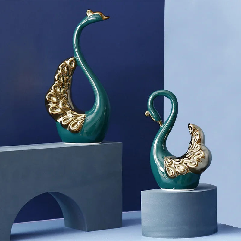 statues cygnes vert doré motif plumeux modernes élégantes décoration intérieure tableaux livres