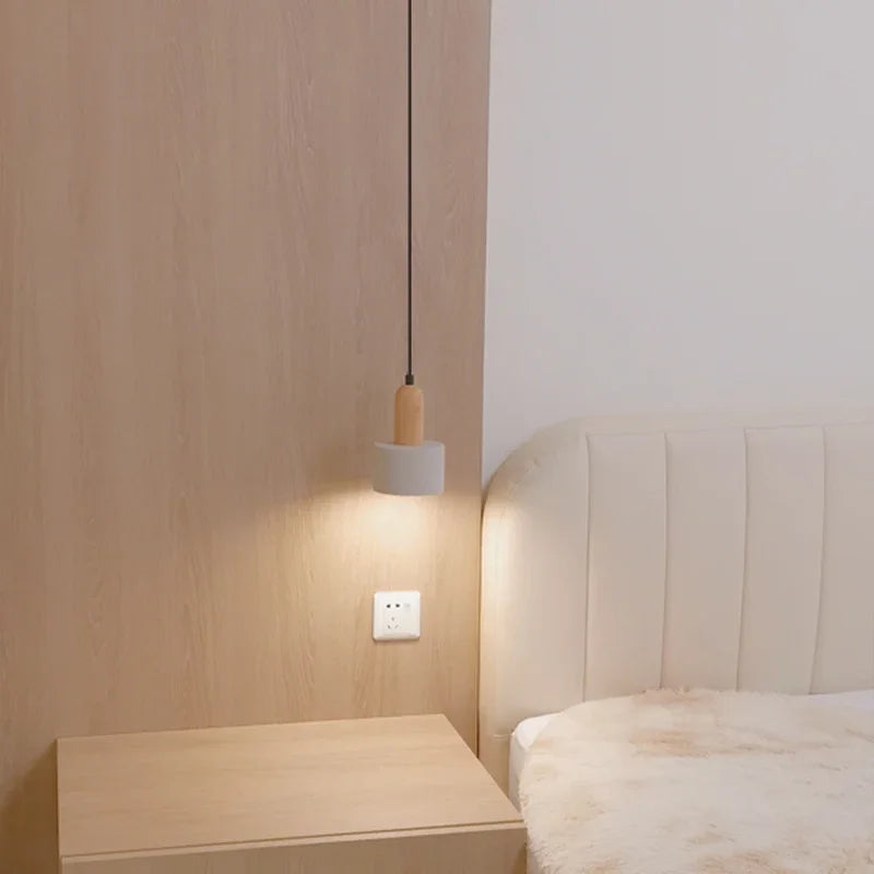 lampe suspendue moderne minimaliste gris clair blanc ampoule led texture béton fixations câble noir