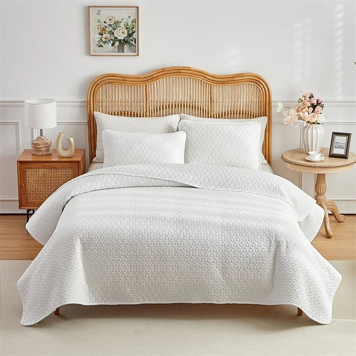 Détail de la texture matelassée de la parure de lit