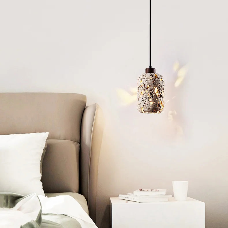 suspension lumineuse moderne pierre texture granulée gris beige noir éclairage ambiance chambre salonhôtel