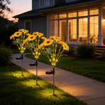 décoration extérieure solaire moderne bouquet lumineux jaune vert tringle métallique fleurs feuilles paysagère
