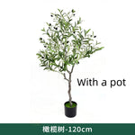 plantes artificielles vertes tronc gris brun moderne decoration intérieure anniversaire exposition sans pot faux