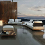 canapé jardin deux places tissu beige bois marron coussins blancs moderne pieds métalliques noirs