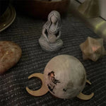 statue méditation femme sphère gris blanche pierreuse sculptée spirituelle intérieure décoration maison
