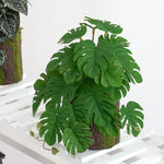 plantes artificielles feuilles vertes rouges noires modernes décoration extérieure mariage centro commercial exposées