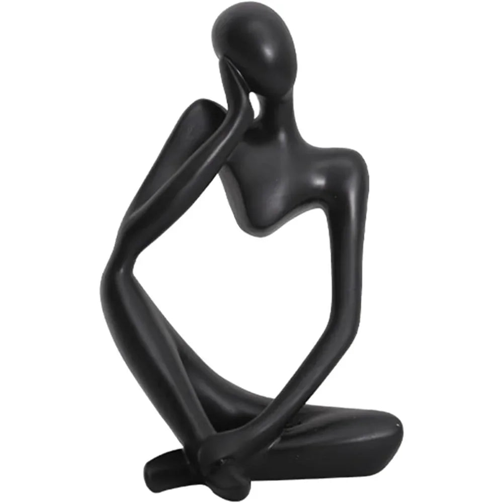 statue décorative moderne figure humaine assise couleur or noir beige.texture granuleuse surface lisseintérieur moderne