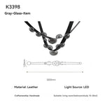 lustre suspension moderne minimaliste noir transparent doré globes organiques chambre salon