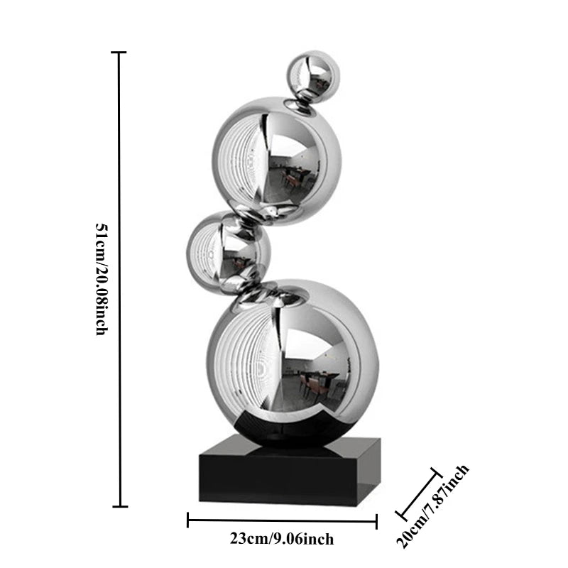 Sculpture décorative moderne or argent sphères polies métal base noire minimaliste