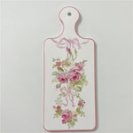 planche découper céramique vintage fleurs roses motifs géométriques blanc roseclair