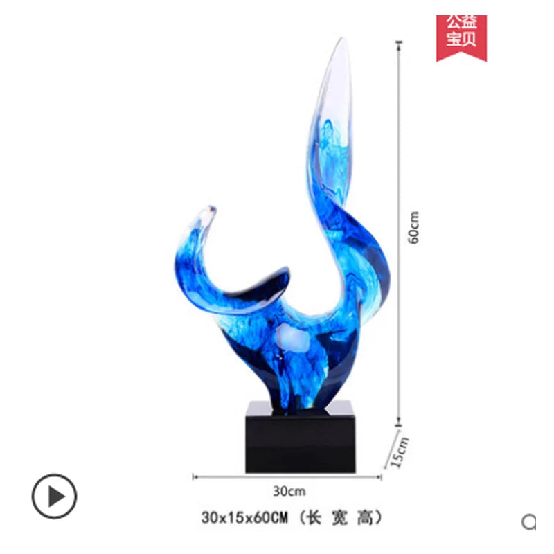 sculpture moderne abstraite résine bleu transparent noir marbreuse posée base pierre noire