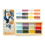 palette peinture aquarelle multicolore compartiments traditionnelle boite bois artiste illustration oiseaux