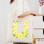 sac main toile beige imprimé floral jaune feuilles respectueux environnement poignées amovibles tridimensionnel multi