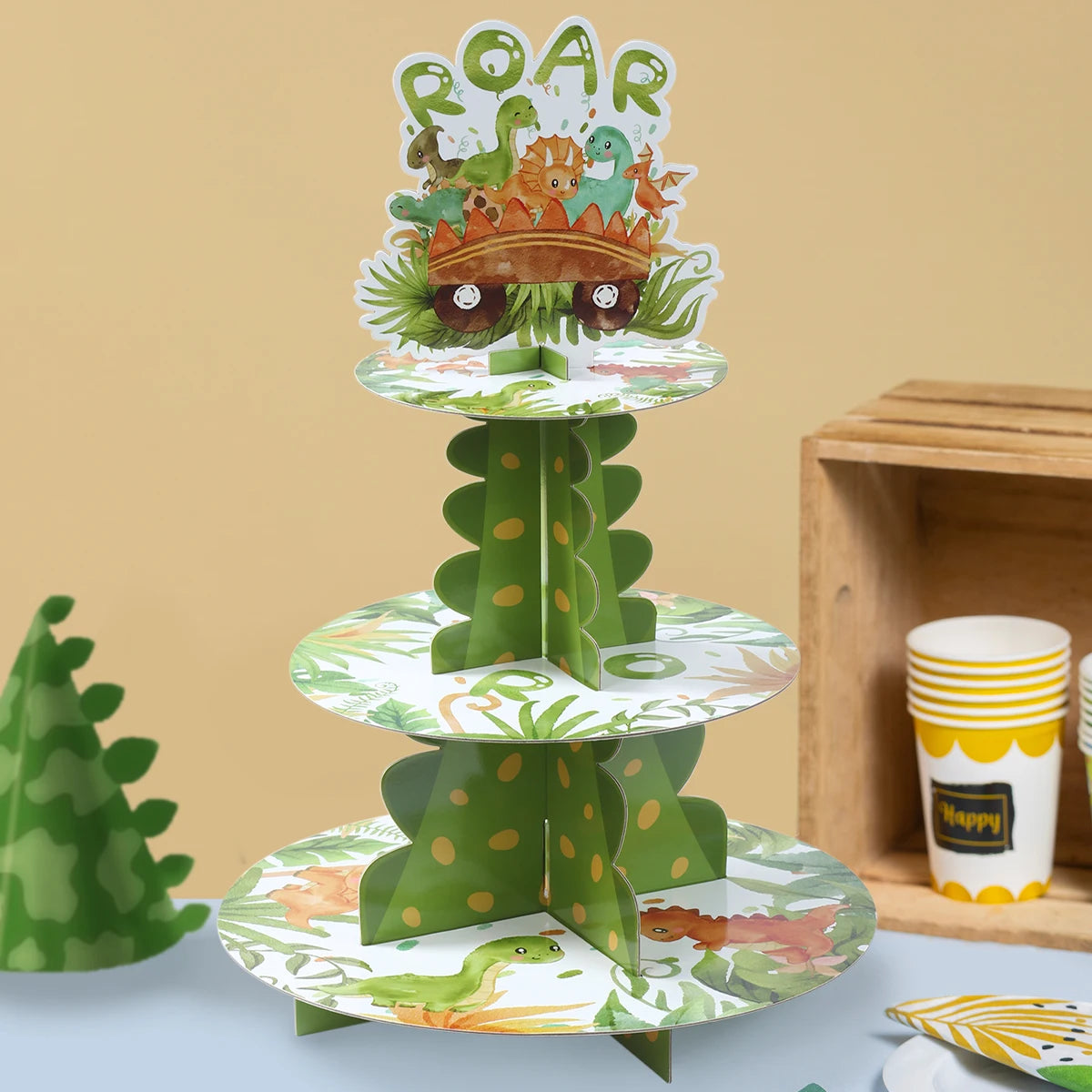 supports cupcakes dinosaures palmiers happy birthday assiettes gobelets sacs cadeaux vert orange blanc enfants