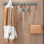 porte sacs mural gris moderne crochets fixations objets accrochés serviettes sacs