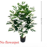 plantes artificielles feuilles monstera grandes nervures blancs moderne decoration intérieure