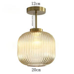 lampe suspendue or vert gris moderne rayures horizontales opacité fixations vis chambre salon éclairage