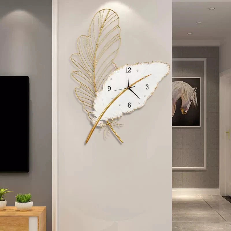 horloge murale moderne blanc doré plume stylisée sans LED fixation sans éléments visible