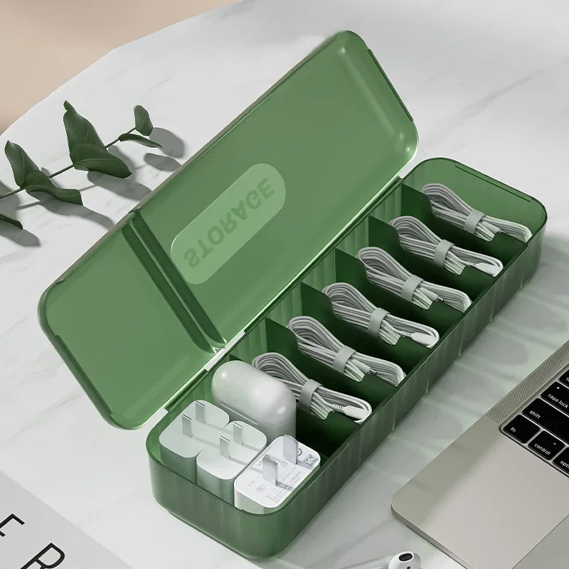 boîte rangement câbles accessoires électroniques vert moderne organisation écouteurs adaptateur usb minimaliste